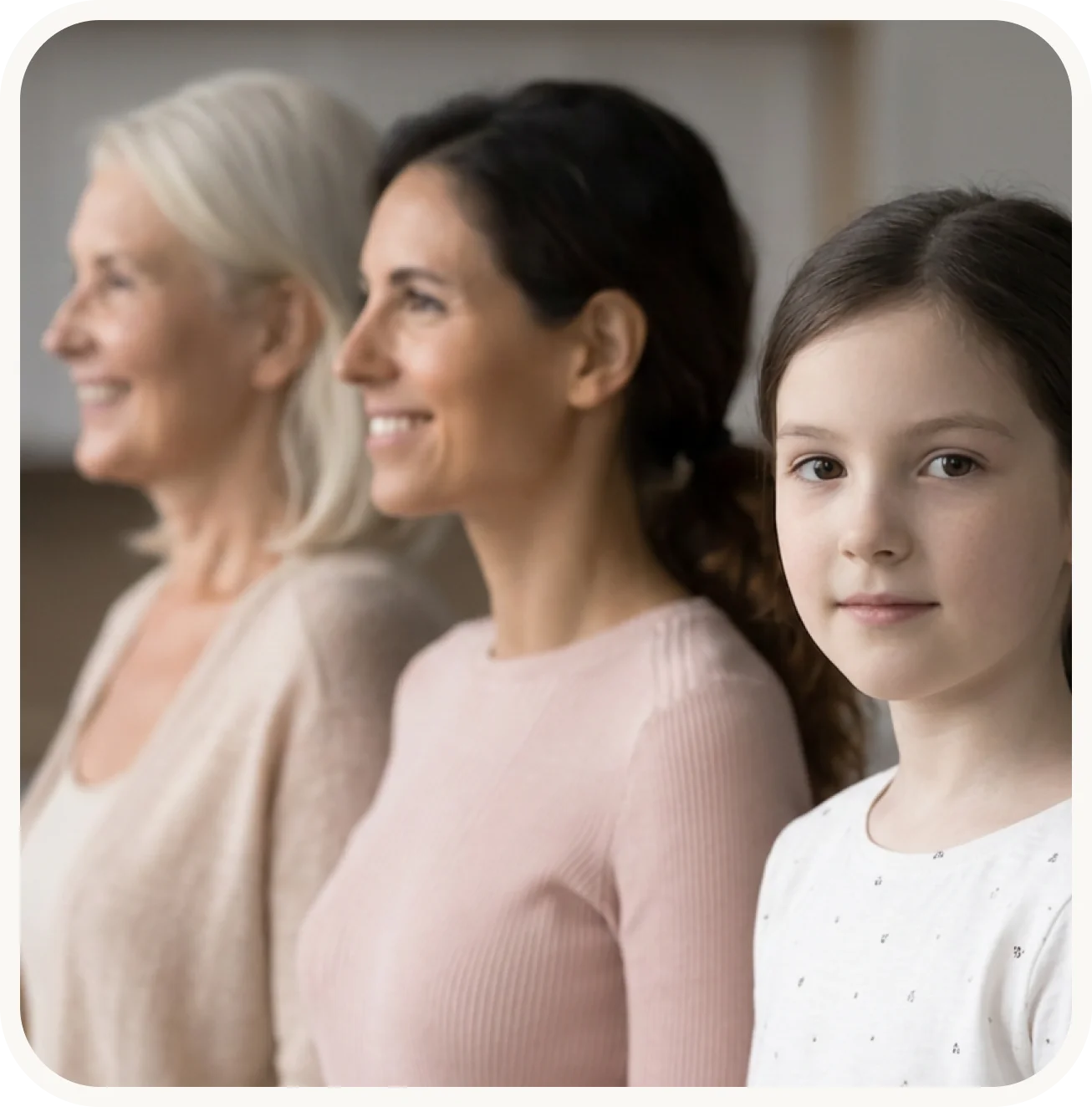 Three generations of women standing together